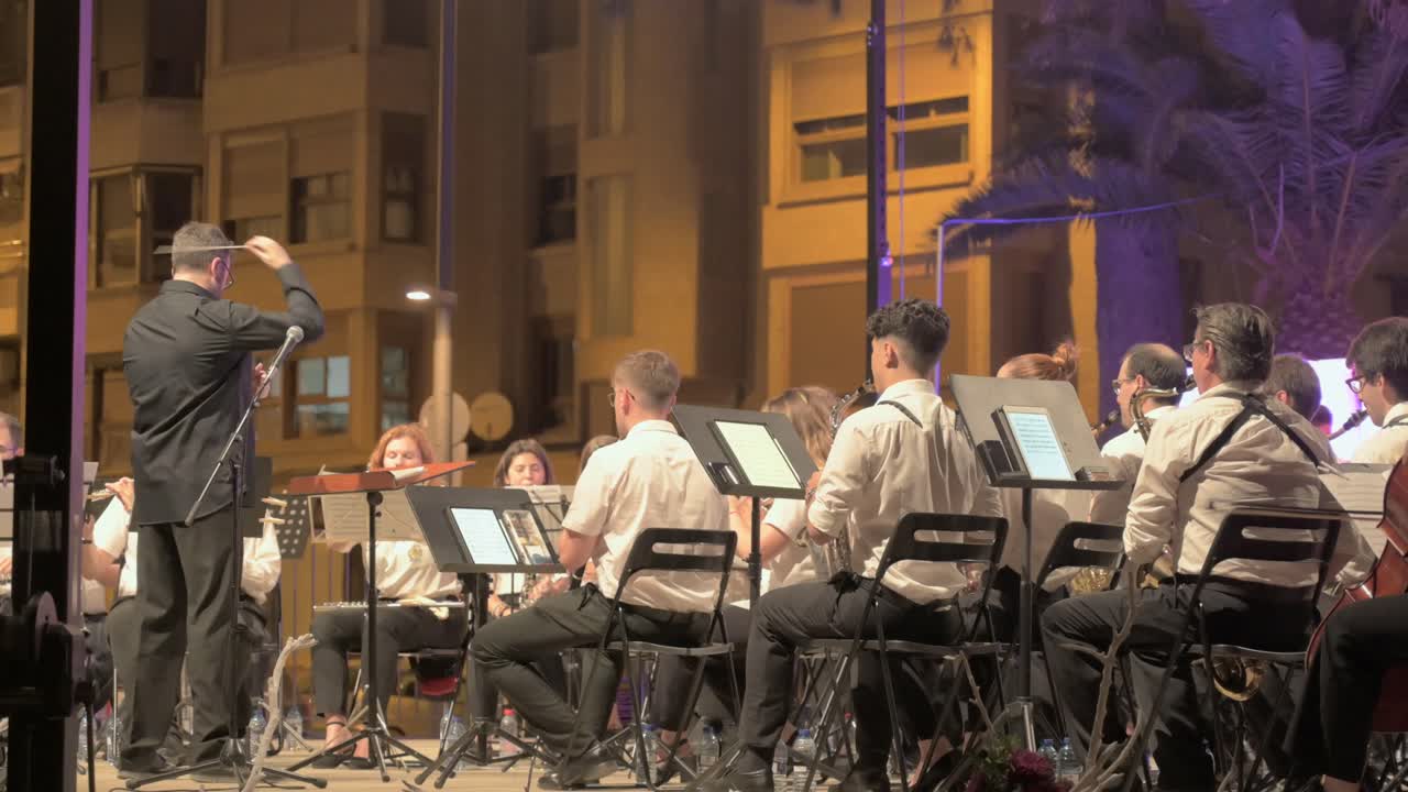 Outdoor Orchestra Performance at Night