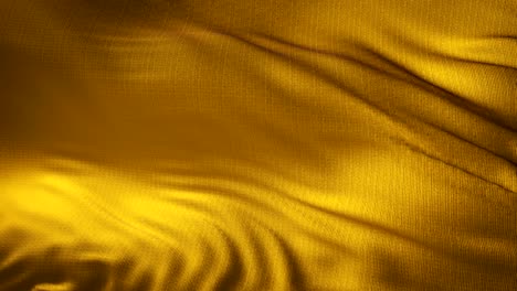 gold textile fabric waving in the wind abstract background