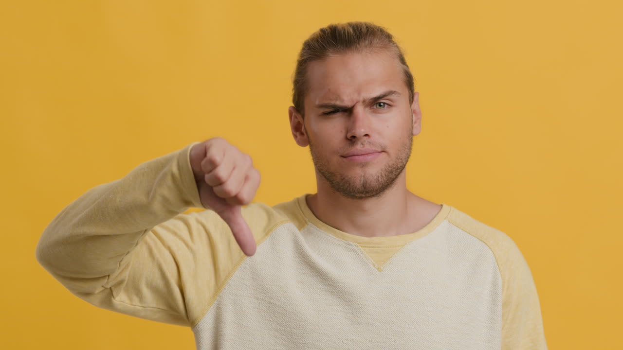 Man giving thumbs down