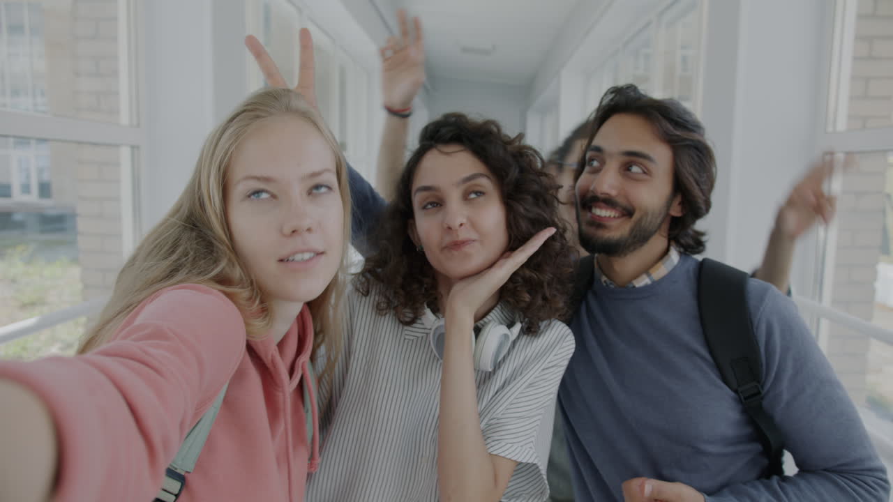 Group of Friends Taking a Selfie in a School Hallway