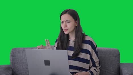Angry-Indian-woman-shouting-on-video-call-Green-screen