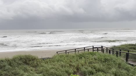 dramatic footage of hurricane miguel in jensen beach, florida. powerful waves crash against the shore, showcasing extreme weather and storm surge. perfect for documentaries, news, and disaster footage