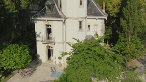 a house nestled in the middle of a garden