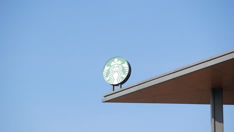 starbucks logo on a building