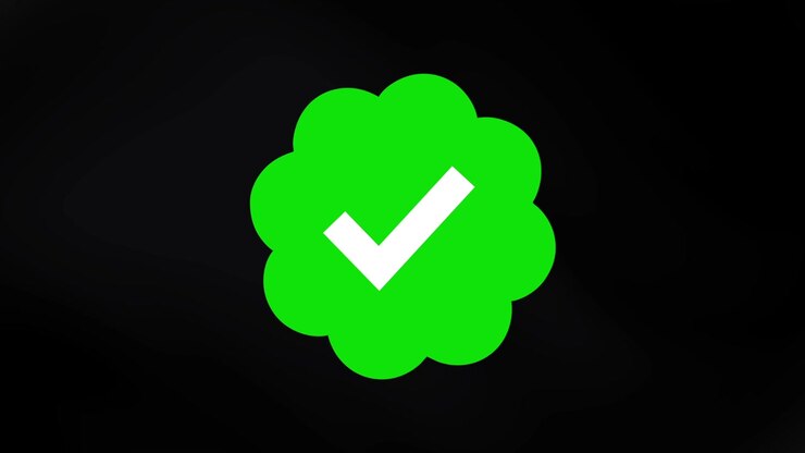 Green Checkmark Icon Appearing on Black Background