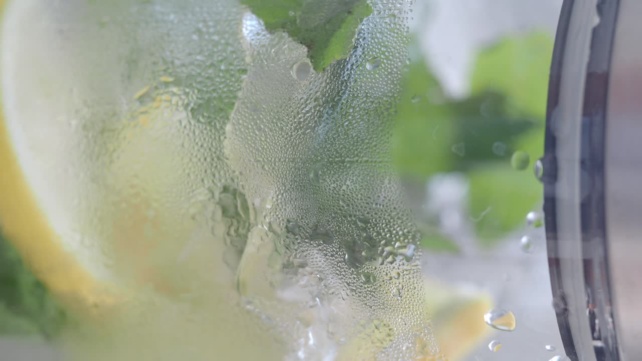 Close up of refreshing lemonade with ice and mint