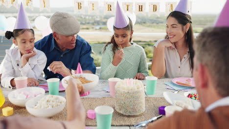 family, food and girl with cake on birthday