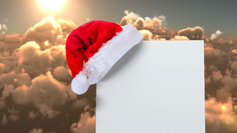 Gorro-De-Papá-Noel-Con-Tarjeta-Blanca-Y-Nubes