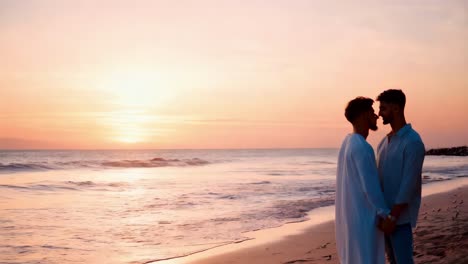 gay couple at sunset on the beach