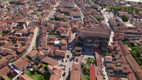 Comacchio-Cathedral,-Italy,-drone-orbit-view-of-urban-infrastructure,-little-Italian-city,-sunny-weather