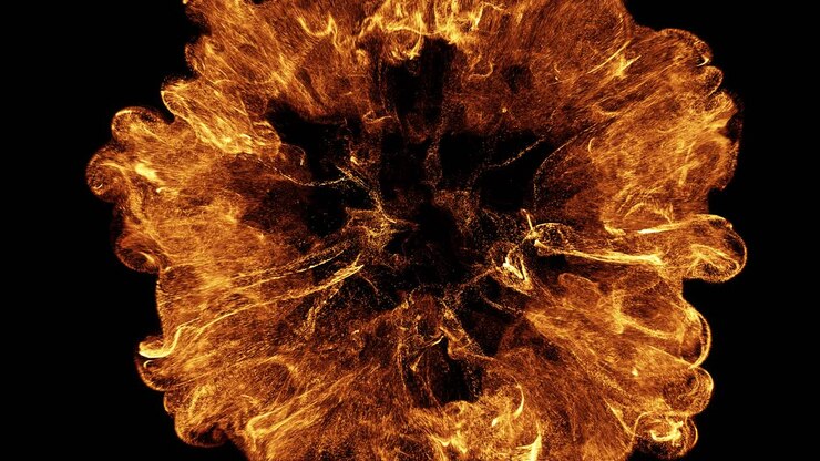 Abstract Fiery Explosion of Particles on Black Background