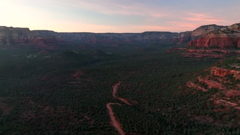 panorama of vegetations at the forest with red cliffs in sedona, arizona, united states