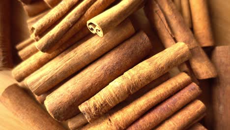 cinnamon sticks rotate as a background cinnamon closeup spices with cinnamon