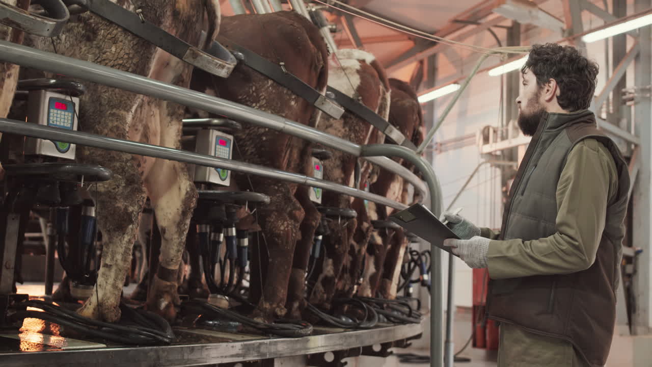 Checking Work of Carousel Milking Parlor
