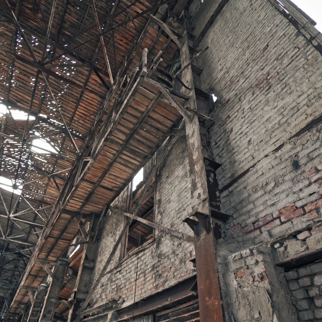 Abandoned ruined industrial factory building. Ruins and demolition concept