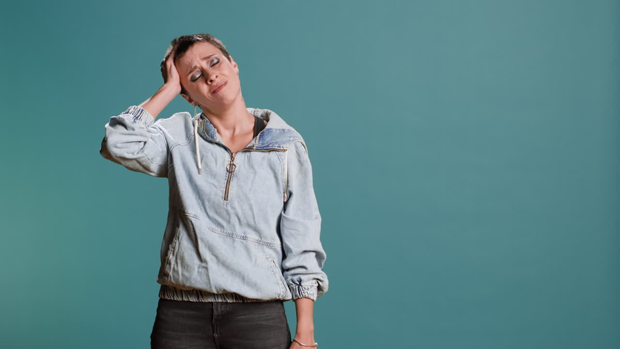 Woman holding bottle of pills