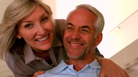 Woman-kissing-her-partner-on-the-cheek