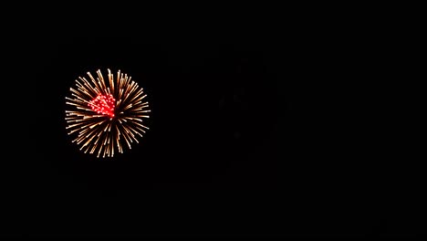 large colorful cluster aerial fireworks on july 4th with mini sparkling explosions