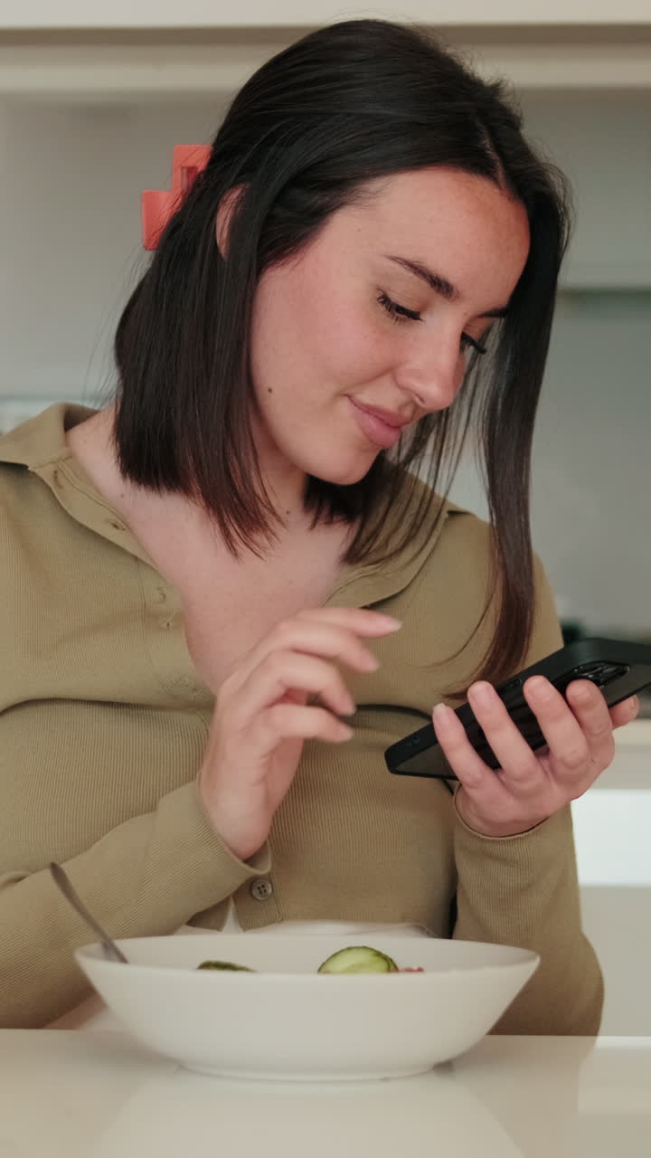 Woman Using Phone at Breakfast