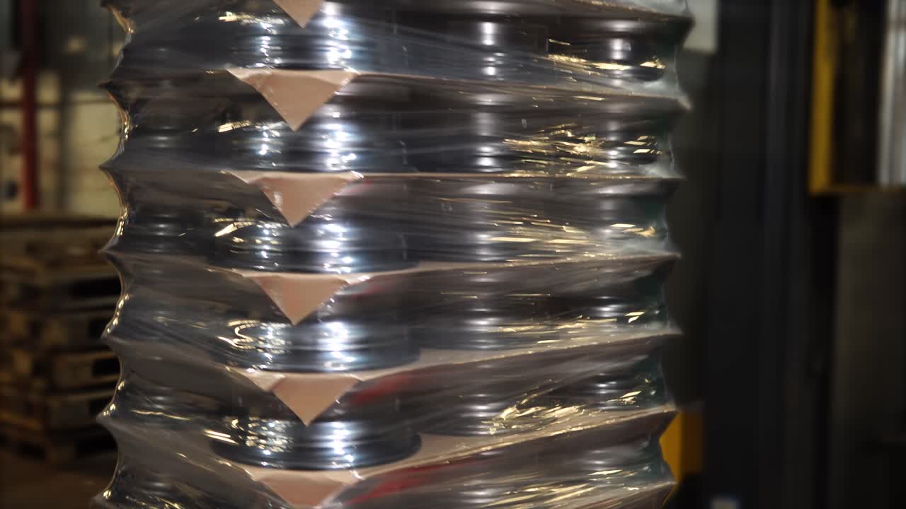 Warehouse products being packaged and loaded.