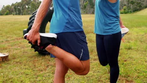 Couple-balancing-on-one-feet-