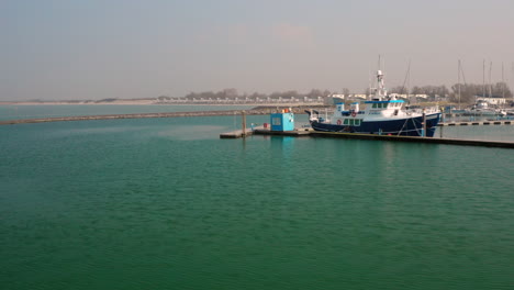 aerial: harbour and vacation park during hazy spring day