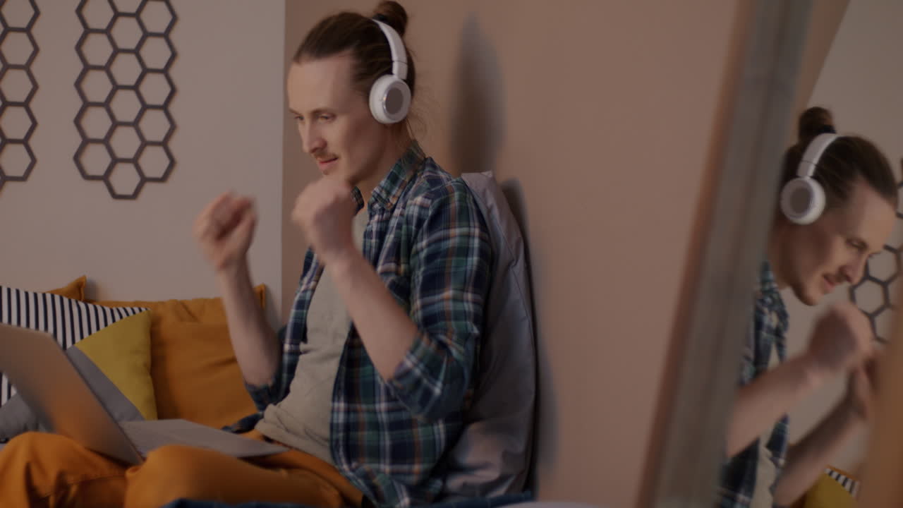 Young Man in a Video Call from Home