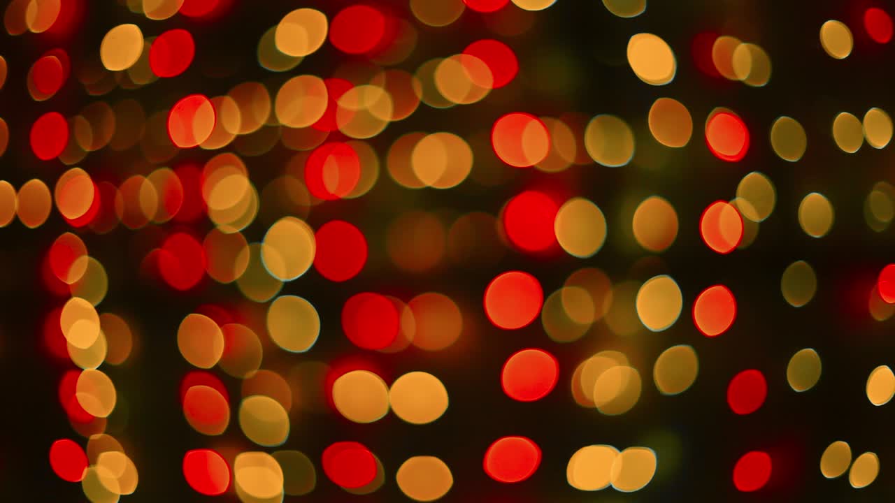 Defocused bokeh cristmas sparkles lights abstract background.