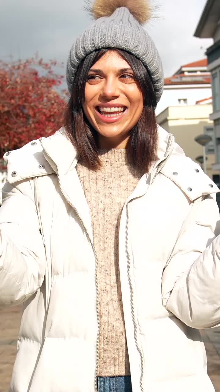 Woman in White Puffer Jacket Taking a Selfie