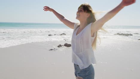 young woman by the sea