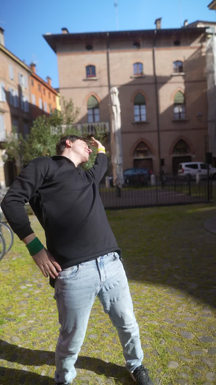 Man Posing Outdoors in a City