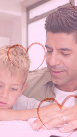 animación de corazones cayendo sobre hombre caucásico y su hijo haciendo la tarea