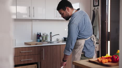 man cooking in a modern kitchen
