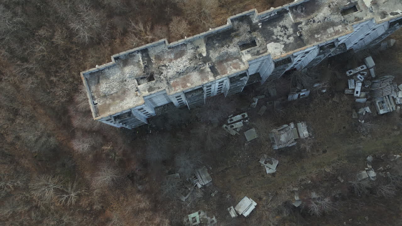 Echoes of War: A Drone's Eye Perspective Above the Haunting Ruins of Abandoned Block of Flats in Eastern Ukraine