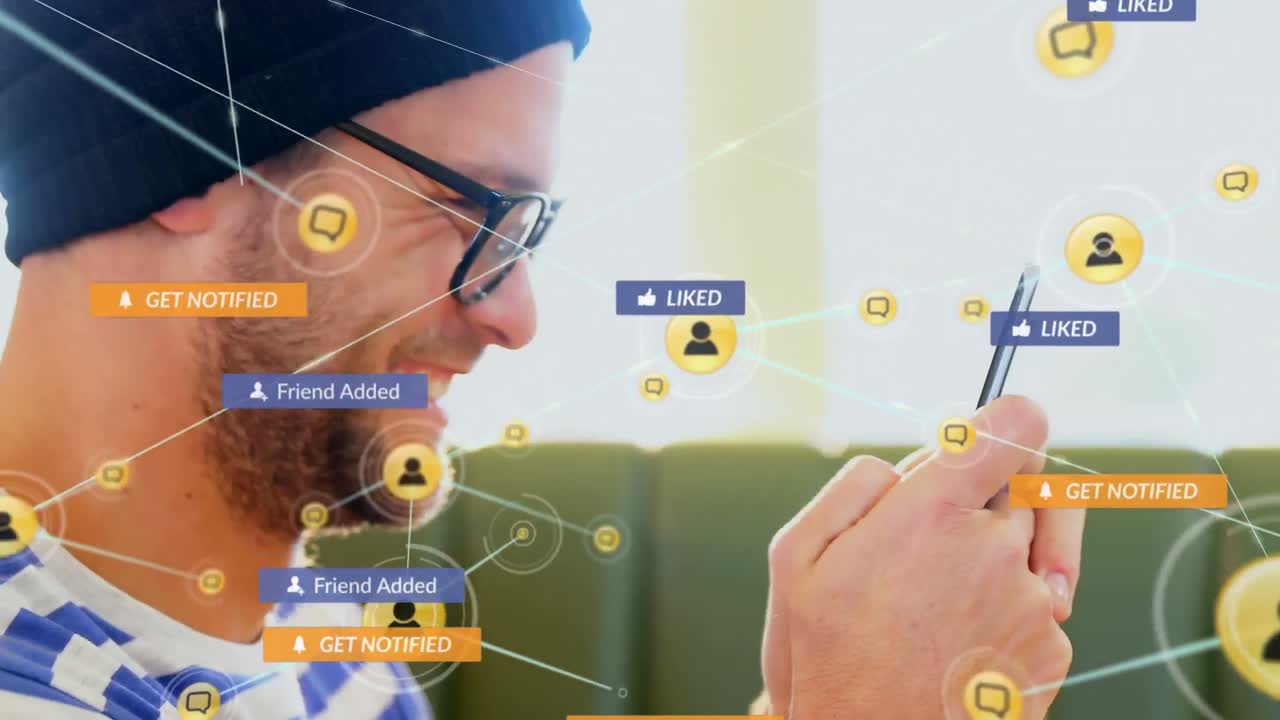 Animation of social media icons and network of connections over caucasian man using smartphone