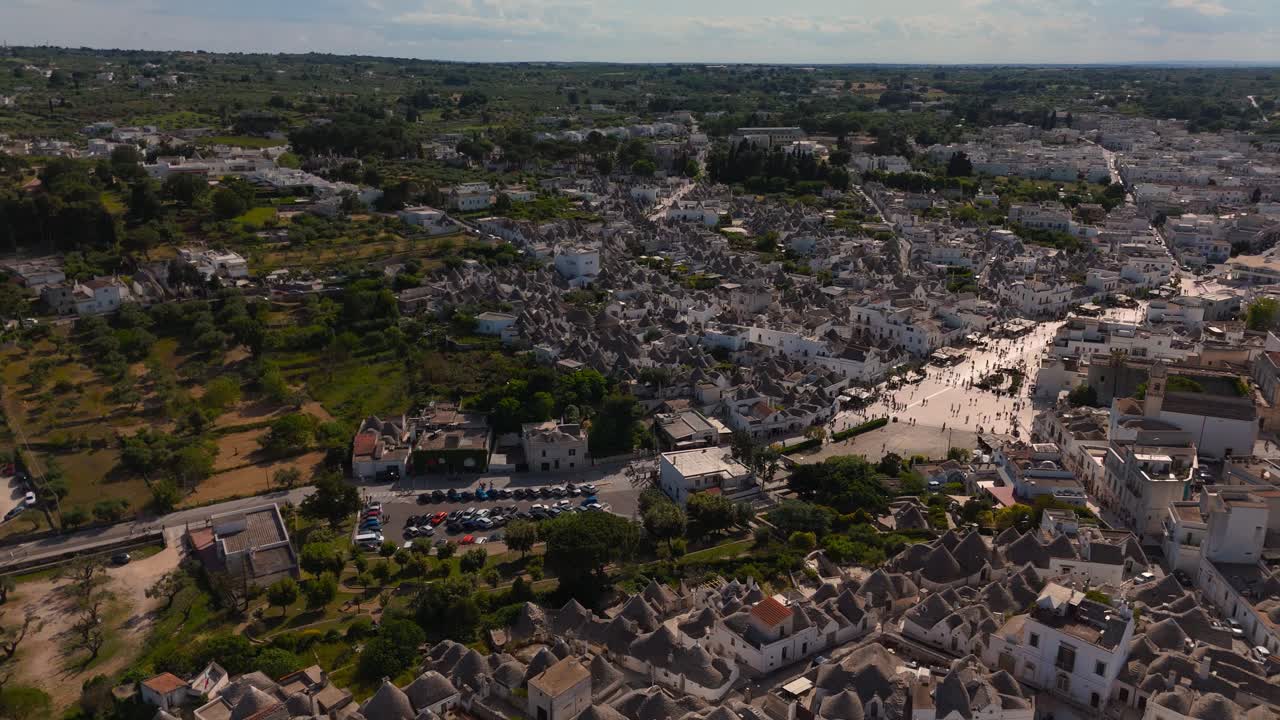 Aerial view of UNESCO-listed Trulli zone in Alberobello, Apulia, Italy. Circular shepherd cabins.