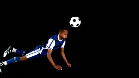 Soccer-player-playing-with-a-soccer-ball-