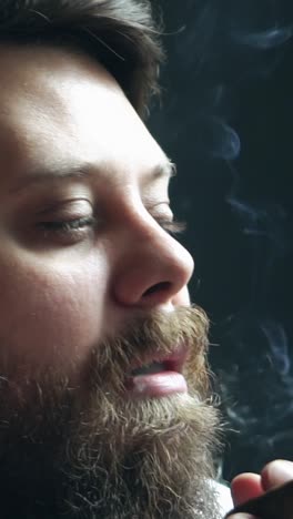 man smoking a cigar