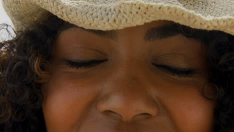 close-up of african american woman standing on the beach 4k