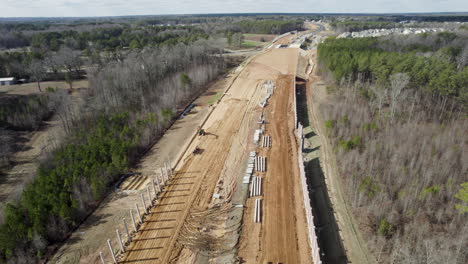 wide drone shot of large highway construction, 540 beltline north carolina