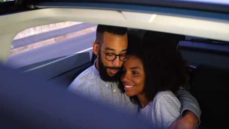 couple interacting with each other in a car 4k