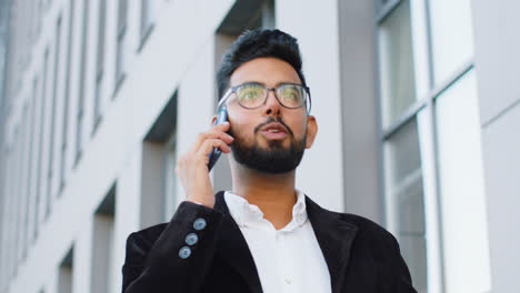happy surprised man involved in pleasant conversation phone call good news enjoying talking gossip