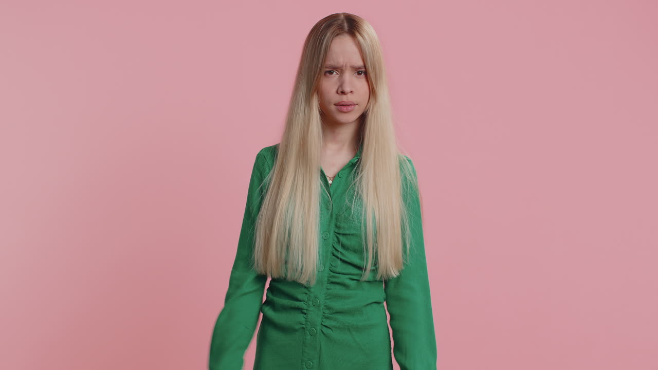 Tired serious upset caucasian woman showing pause gesture stop sign time out relax break deadline