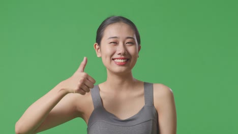 happy woman giving thumbs up