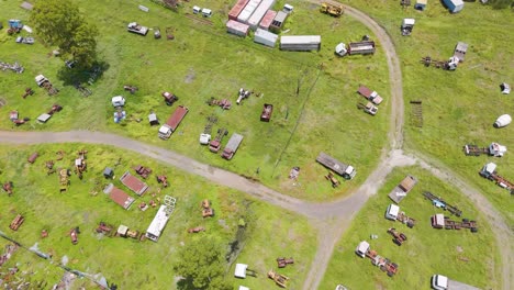 aerial footage of a rural scrap yard