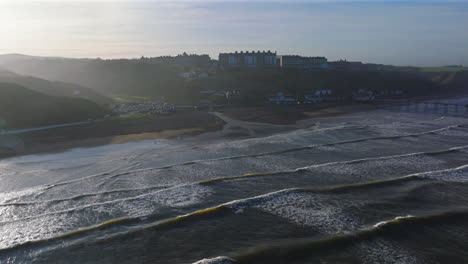 Establishing-Aerial-Shot-of-Saltburn-by-the-Sea-Coastal-Town-High-Tide