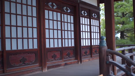 traditional wooden sliding doors in an old temple in kyoto, japan medium shot