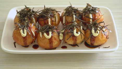 takoyaki ball dumplings or octopus balls - japanese food style