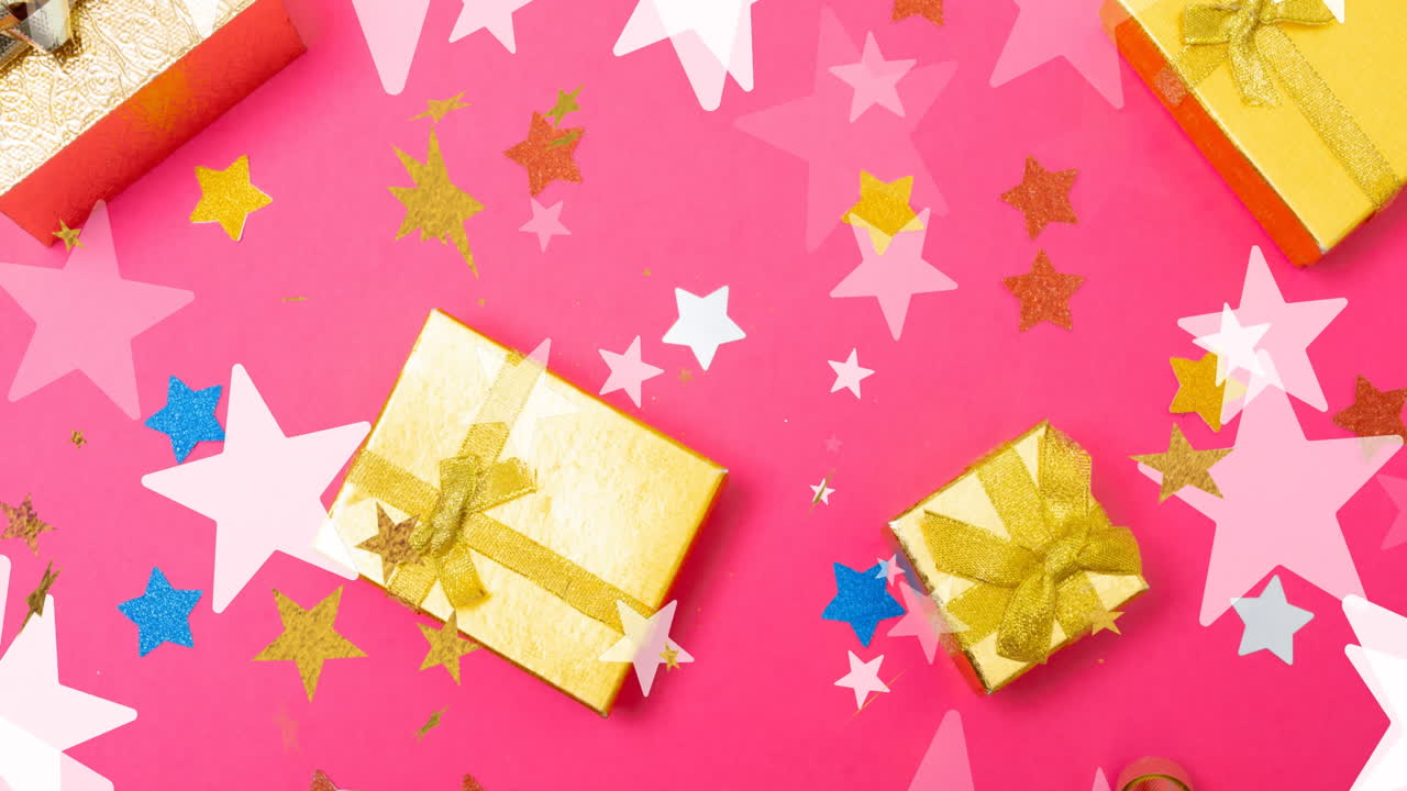 animación de estrellas que caen sobre los regalos de navidad