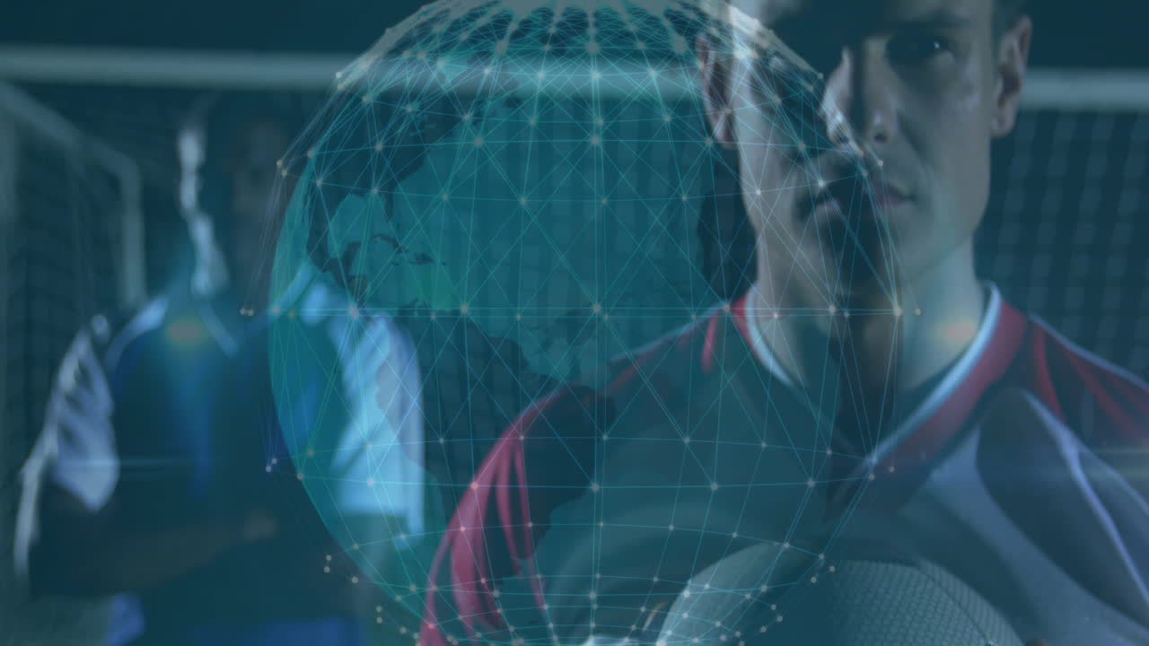 Male soccer players holding ball and crossing arms on field projecting holographic technology globe